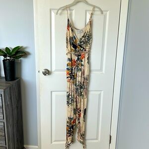 Jumpsuit with open leg side slits and tied cuffs size M